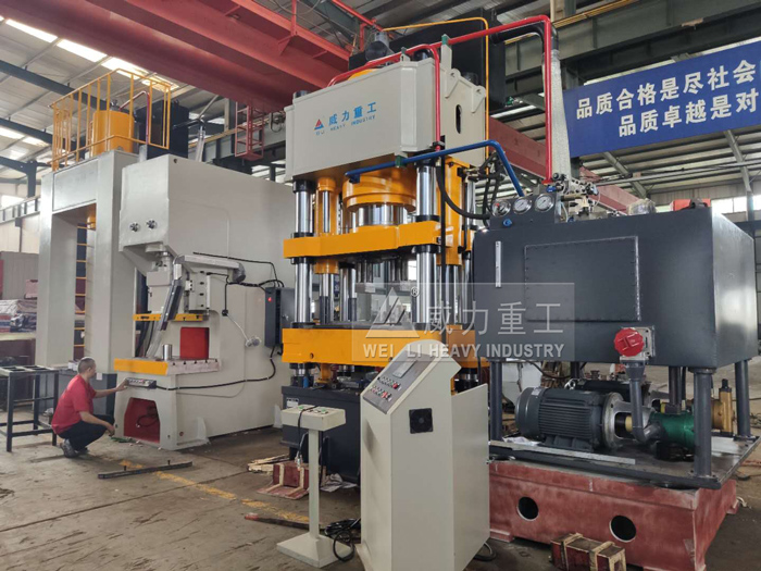 一模兩塊牛羊舔磚液壓機(jī)