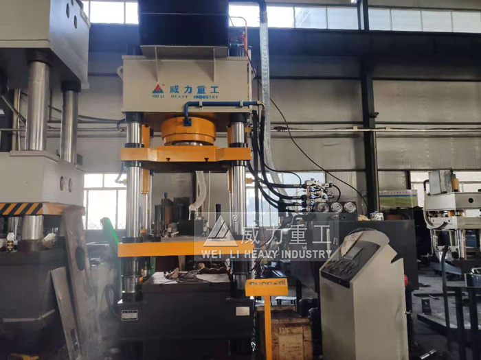 四梁四柱液壓機壓制配重塊成品